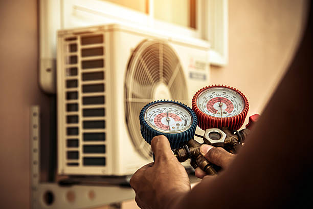 Professional Hvac technician working in Great River, NY